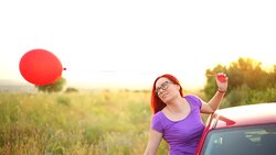 Hippie girl in the car on a journey Stock Footage
