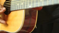 man playing guitar close up Stock Footage
