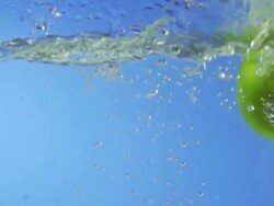 Green Apples Splashing Into Water (Super Slow Motion) Stock Footage