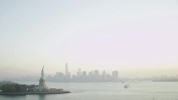 'WS AERIAL View of Statue of Liberty and lower Manhattan / New York City, United States' Stock Footage