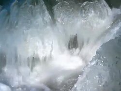 HD Icy Mountain River Close-up (Loopable) (4:2:2@100 Mb/s) Stock Footage