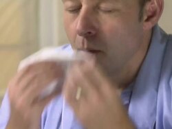Man sneezing Stock Footage