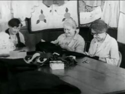 B/W 1934 3 senior women sewing in WPA garment factory / documentary Stock Footage