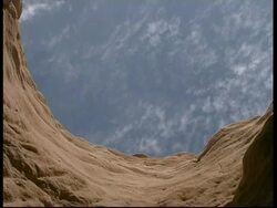 Clouds passing through sky from copper mine, Israel Stock Footage