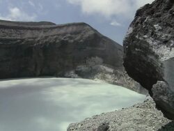 MS Clouds move over Rincon de la Vieja volcanic lake / Guanacaste, Costa Rica Stock Footage