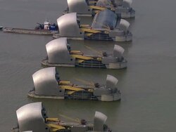 Aerial medium shot Thames River flood defence system / London, England Stock Footage