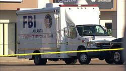 The FBI says it is investigating the shooting dead of four marines in Tennessee as an act of terrorism and they're following 70 leads. Mohammed Youssef Abdul-azeez opened fire at two military bases in Chattanooga using two shotguns and a handgun. News Clip