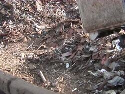  MS Dumper throwing out steel scrap at scrapyard / Bous, Saarland, Germany Stock Footage