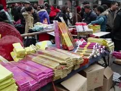 MS Joss sticks and articles for use to pray solding at market during Chinese Lunar New Year / xi'an, shaanxi, china Stock Footage