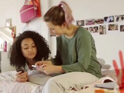 Teen girls texting   TEE Stock Footage