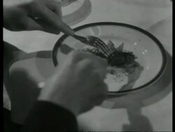 Chromium alloy steel does not rust or corrode and is used in plating - cutlery; ash tray, UK 1939 Stock Footage