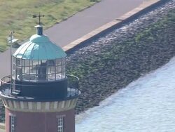 AERIAL MS View of lighthouse / Cuxhaven, Schleswig-Holstein, Germany Stock Footage