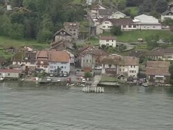MS AERIAL Shot of Coast along lake Geneva last of France / Rhone Alpes, France Stock Footage