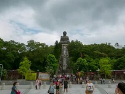 Time-lapse HD: Pedestrians at Ngong Ping Giant buddha Hong Kong Stock Footage