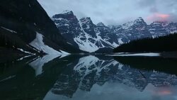 Track shot of Moraine Lake in early summer, Banff NP Stock Footage