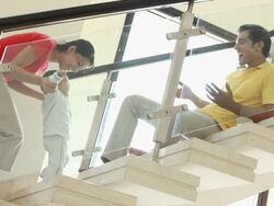 Mother helping to walk her baby  Stock Footage