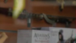 Knives on display in shop window News Clip