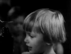 B/W 1934 close up little girl being served spoonful of medicine at nursery school / WPA project / newsreel Stock Footage