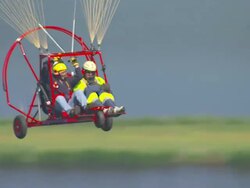 WS AERIAL ZI ZO DS View of paragliding / Werribee, Victoria, Australia Stock Footage