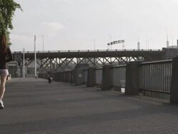 MS POV SLO MO Shot of female jogger on city water front at dawn / Portland, Oregon, United States  Stock Footage