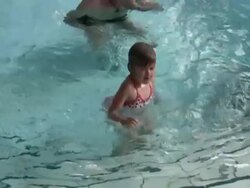 Dad Teaching Daughter to Swim Stock Footage