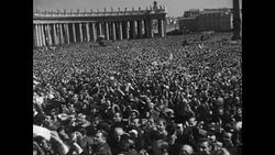 Pope Pius XII gives benediction from balcony as demonstration happens below in St. Peter's Square News Clip
