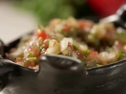 Spoon taking salsa. Stock Footage