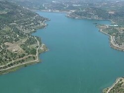 WS AERIAL ZI View of reservoir dam / Lasithi, Crete, Greece Stock Footage