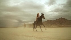 (Slow Motion) Riding Horses in the Dessert 02 Stock Footage