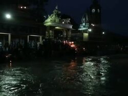 Pilgrims worshipping at riverbank, Ganges River, Haridwar, Uttarakhand, India Stock Footage