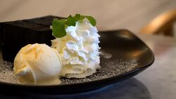 Charcoal toast with ice-cream and whip cream Stock Footage