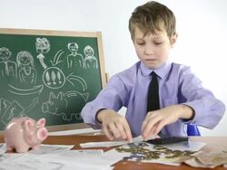 boy businessman and piggy bank Stock Footage