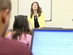 Caucasian Female Teaching Adult Students - MS Stock Footage