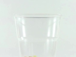 Pills pouring into a cup Stock Footage