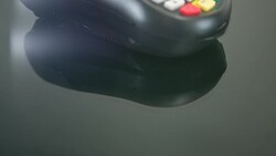 Woman making contactless payment with smartphone Stock Footage