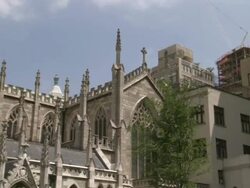 WS ZI View of old church amongst  skyscrapers of city / New York City, New York, United States Stock Footage