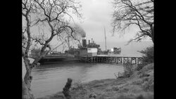 WS Ship moored at dock / United States Stock Footage