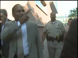 O.J. Simpson's trial on charges that he robbed two sports memorabilia dealers in Las Vegas a year ago began Monday. Simpson and co-defendant Clarence 'C.J.' Stewart have pleaded not guilty to 12 charges including kidnapping, armed robbery and conspiracy. News Clip