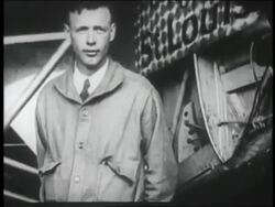 B/W 1927 Charles Lindbergh standing by the Spirit of St. Louis airplane / NY Stock Footage