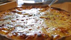 Serving Pizza on the table Stock Footage