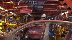 Robots weld auto parts on an assembly line. Stock Footage