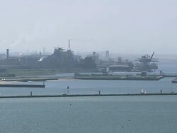 WS AERIAL ZI ZO PAN View of industrial area at Dunkirk harbour / Pas-de-Calais, France Stock Footage