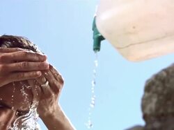 HD Super Slow-Mo: Muslim Man In Process Of Ablution Stock Footage