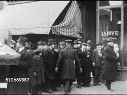 1920: THE RED SCARE: People standing on sidewalk watching men carrying boxes out of Communist newspaper Laisve (Liberty) storefront office & pushing into wagon, PAN Papers in wooden boxes. Anti-communism, xenophobia, possibly part of Palmer Raids. Instructional Video