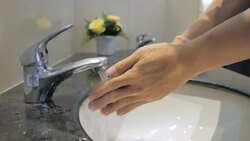 Young men washing his hands in bathroom,Slow motion Stock Footage