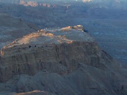 WS AERIAL POV Cave on mountain / Masada, Sourn Judea Desert, Israel  Stock Footage