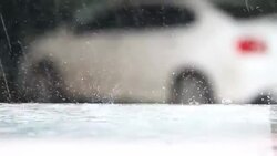 Hard Rain drops on a car roof Stock Footage