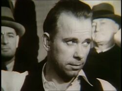 B/W 1930's close up of John Herbert Dillinger (gangster) Stock Footage