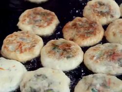 CU Korean traditional food Hotuk (Cinnamon and syrup filled pancake) / Seoul, South Korea Stock Footage