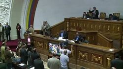 VOICED : Parlamento venezolano jura tres diputados suspendidos News Clip
